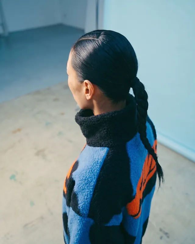 A woman's portrait captured in a striking editorial photograph